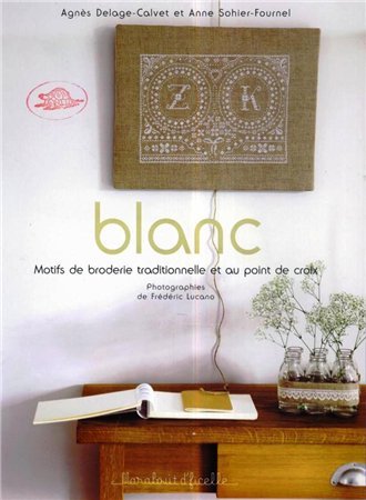 Blanc. Motifs de broderie traditionnelle au point de croix 